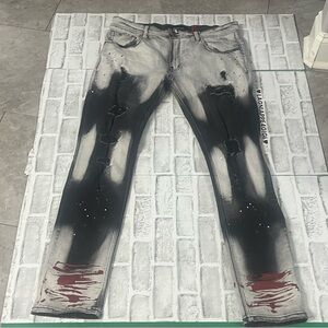Makobi Stylish Black and Gray Distressed Men's Jeans. Red splatter. 40x32. Used.